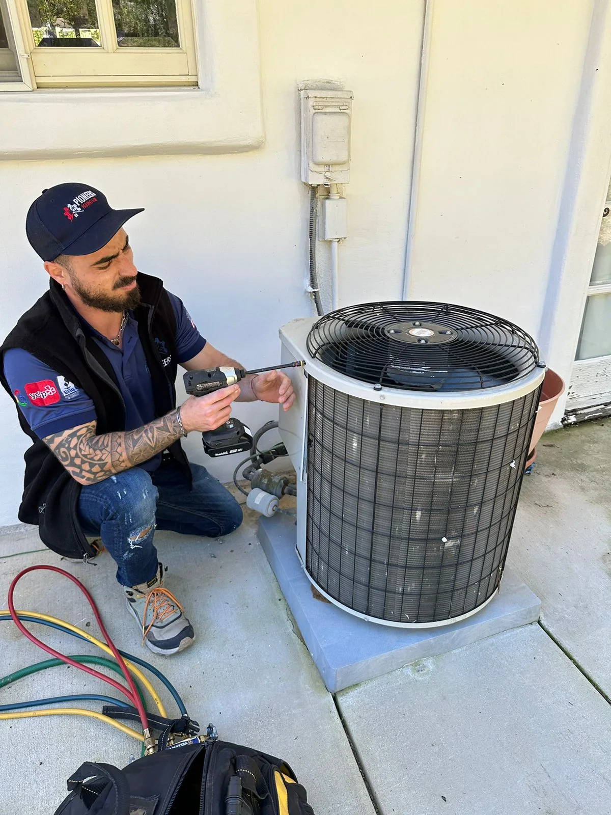 outdoor air conditioning components cleaned and inspected by a technician, real company service photo 1