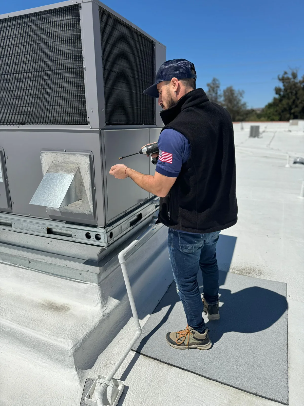 outdoor air conditioning components cleaned and inspected by a technician, real company service photo 2